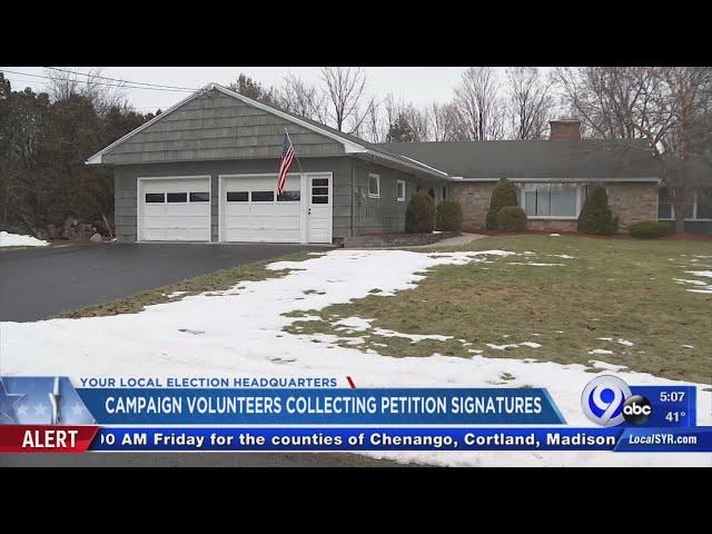 Campaign volunteers collecting petition signatures