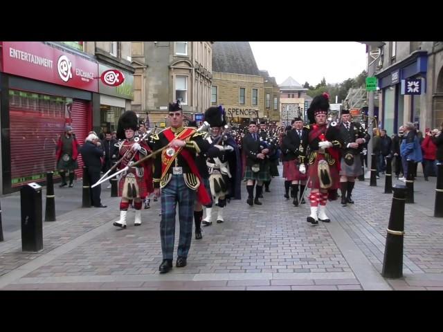 Massed Pipe Bands parade through Inverness City centre for Crocus Group event April 2017