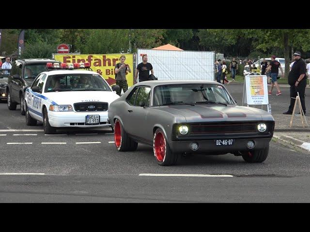 Classic US & Muscle Cars leaving a Car Show in Grefrath-Cuda, Bel Air, Chevelle, Roadrunner,Hot Rods