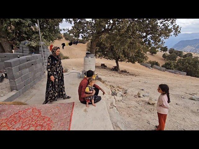 Making dreams: Akram's new kitchen takes shape with Hamid's help.