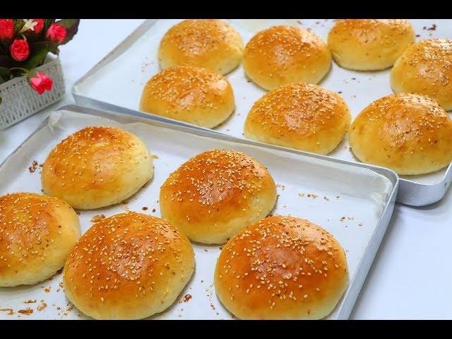 The burger bread and the secret to its crispness and tenderness is 100% successful خبز البرجر