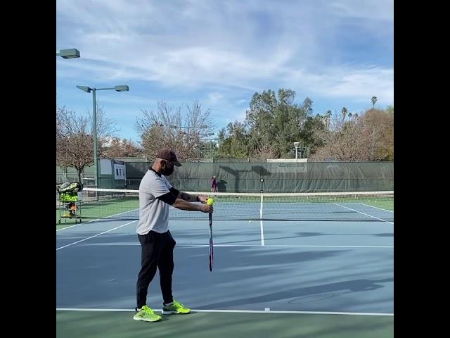 Racquet toss trick serve