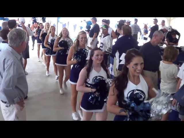 Pep band and cheerleader entrance to Penn State Alumni pep rally