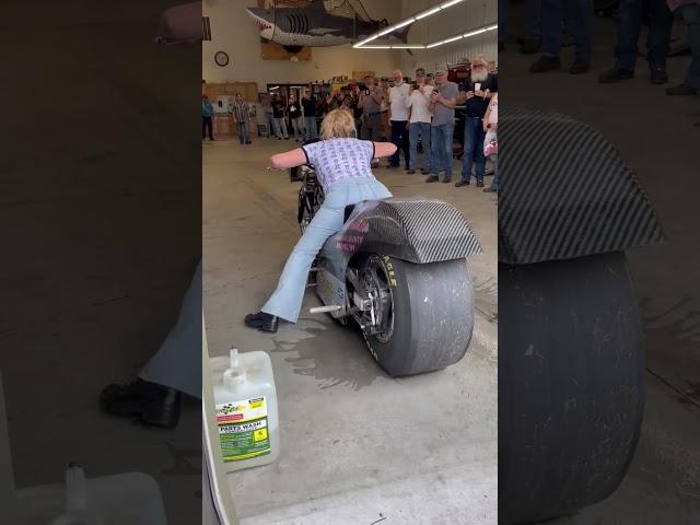 Girl burnout on her drag bike