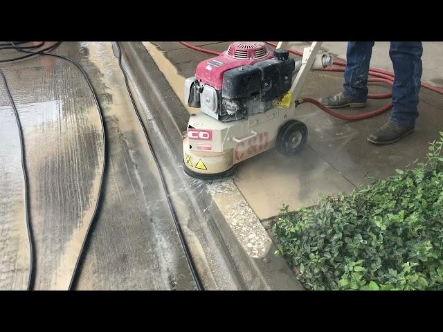 Concrete Grinding a Curb to Remove Trip Hazard