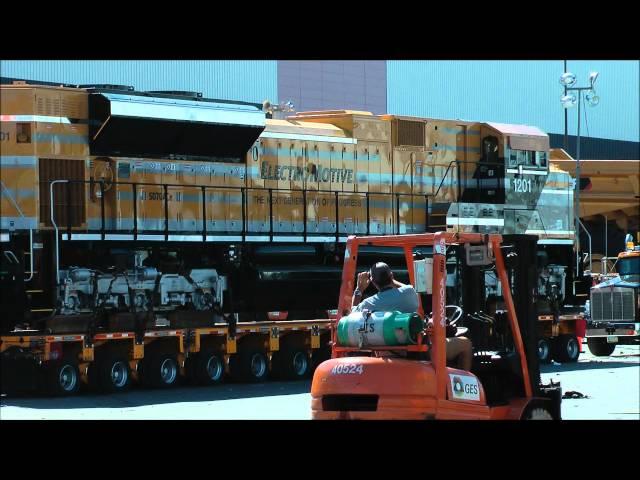 Caterpillar Electro - motive train being moved by road