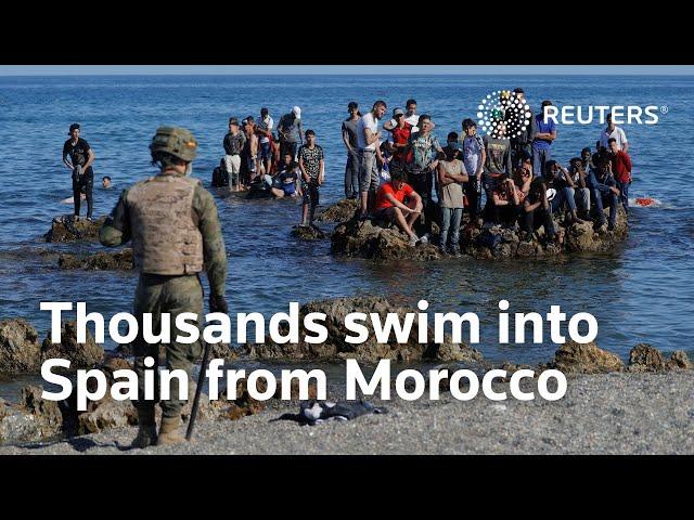 Thousands of migrants reach Spain from Morocco