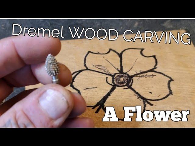 Power Wood carving a flower with  a dremel and kutzall carving bur.