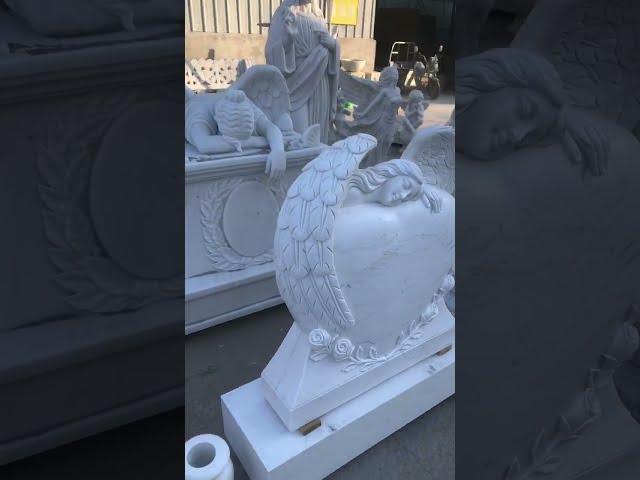 Hand carved marble angel headstone