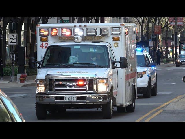 Chicago Police transporting with a Fire Department ambulance