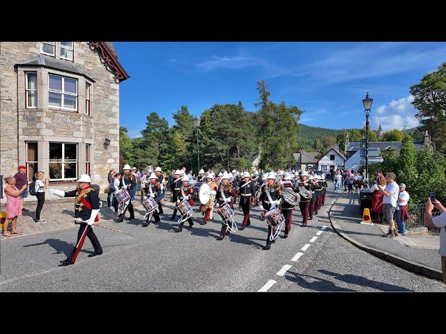 The Band of HM Royal Marines Scotland playing on march to the 2024 Braemar Gathering Highland Games