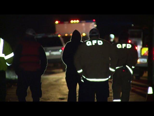 Search for children after truck swept away