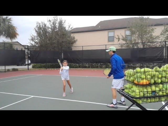 Kids beginner tennis backhand taught by Coach Joe