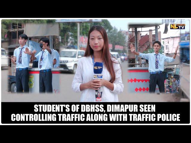 STUDENT'S OF DBHSS, DIMAPUR SEEN CONTROLLING TRAFFIC ALONG WITH TRAFFIC POLICE