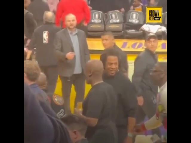 JAY-Z attempts to calm Denzel Washington down during heated argument at Lakers game