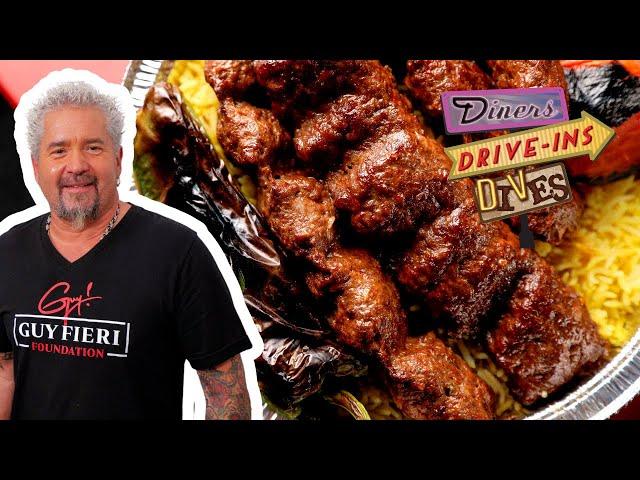 Guy Fieri Eats Persian-Armenian Kabobs with a Twist | Diners, Drive-Ins and Dives | Food Network