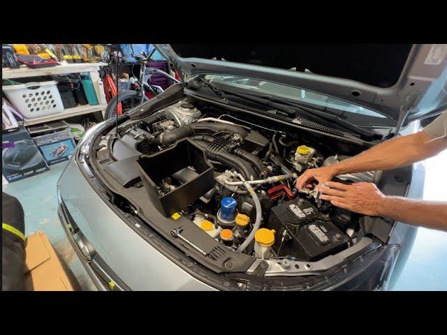 How to remove and charge a Subaru Impreza Battery with jumper cables