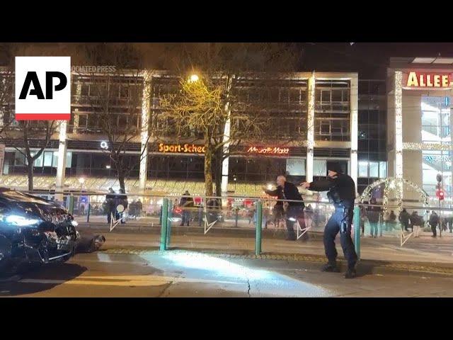 Video shows Germany police detaining suspect at gun point after suspected attack