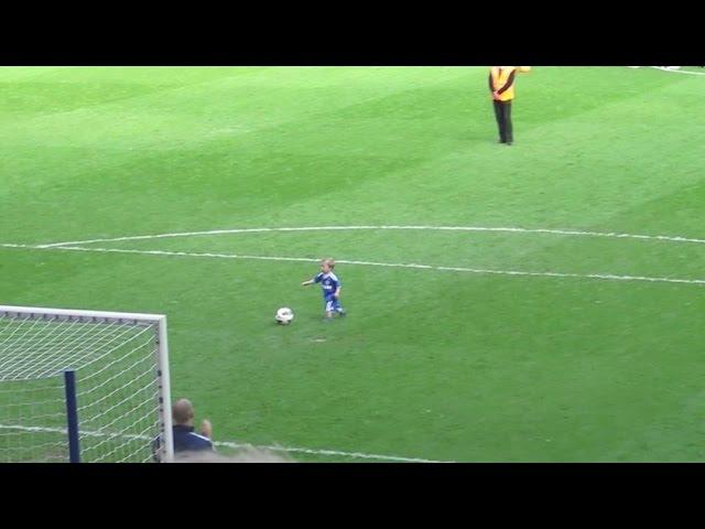 Crowd Cheers after Child Makes Goal