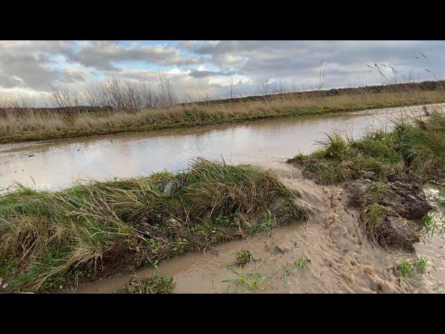 DRAINING A POND! TOTALY BLOCKED THE ROAD!