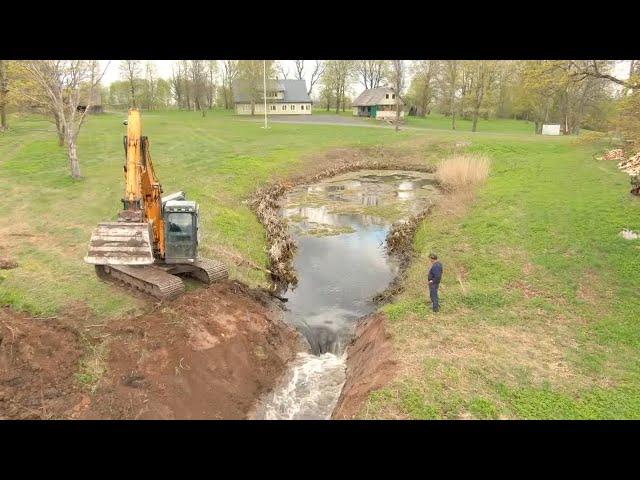 Removing A Pond Dam To Clean It Properly