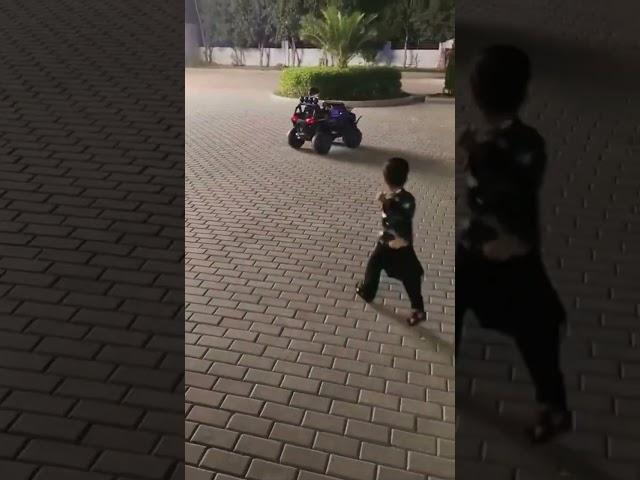 Arham playing with Electric Jeep