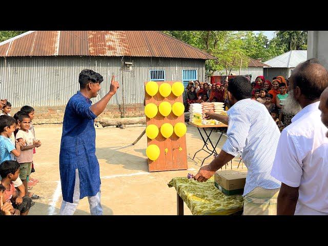 আজব খেলায় চাল, ডাল, তেল জেতার চ্যালেঞ্জ। তীর মেরে বেলুন ফাটিয়ে সবচেয়ে বেশি পুরস্কার কে জিতলো দেখুন ?