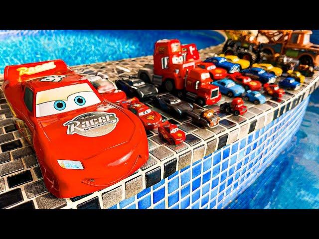 Disney Pixar Cars falling into deep pool, Lightning McQueen, Tow Mater, Mack, Sally, Francesco