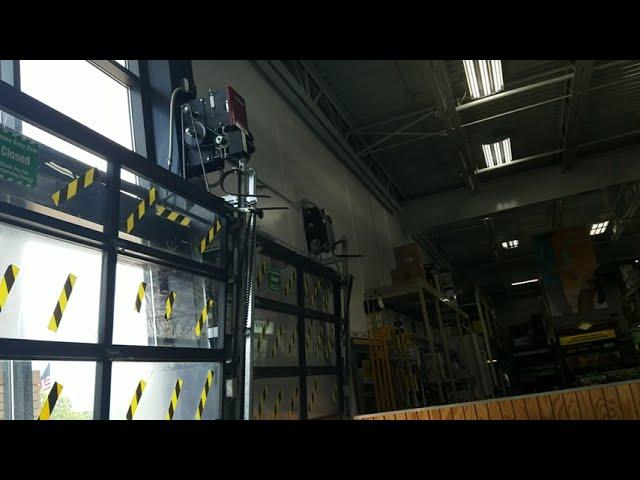 LiftMaster J501L5 and MJ5011U on Vertical Lift Full View Doors at Menards