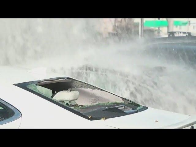 Water main break shatters car windows in West Hills