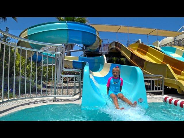 Indoor Waterpark | Child on a Water slide in the Water Park