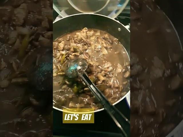 BLACK STEW EATEN WITH RICE
