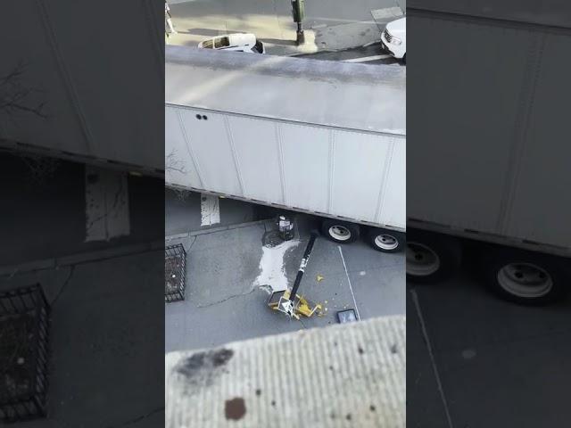 truck making tight turn on residential street pt5