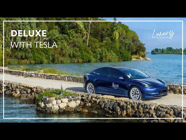 Ikos Goes Green with Tesla | Luxury Worldwide