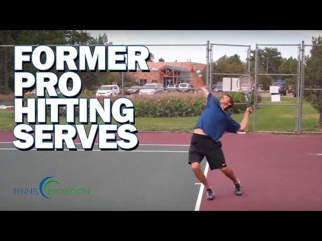 Pro Tennis Player Hitting Serves