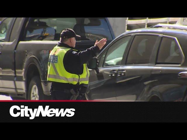 Spotting police directing traffic instead of traffic agents