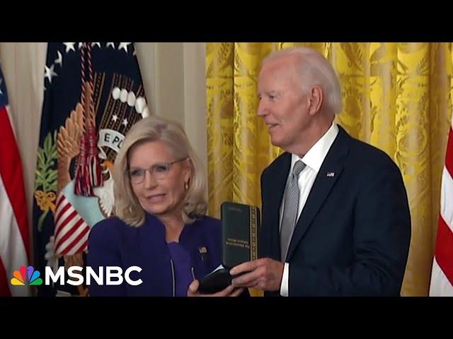 See Liz Cheney get standing ovation at Biden White House event