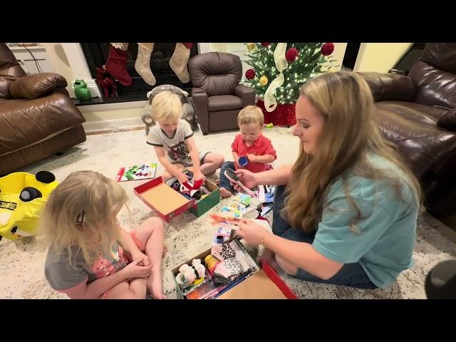 Packing Boxes for Operation Christmas Child with Jack of the South and Family To Bless A Child