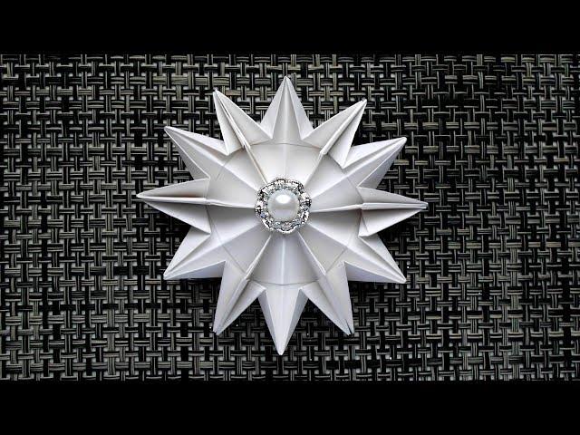 Volume snowflake out of paper. Christmas crafts and ideas