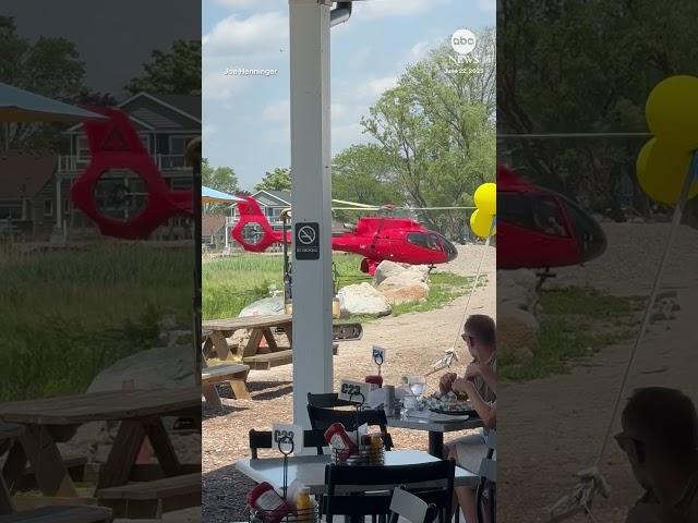 Helicopter rolls onto its side during landing in Michigan