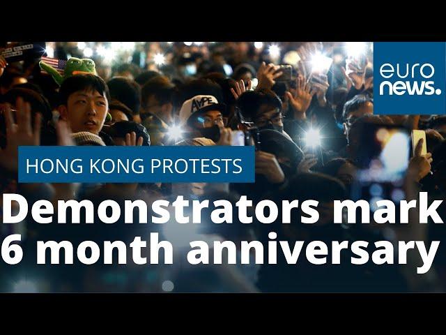 Pro-democracy demonstrators in Hong Kong mark six months of protests