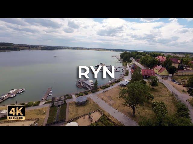 Ryn położony nad jeziorami: Ryńskim i Ołów | Mazury | Dji Avata | Lece w miasto [4k]