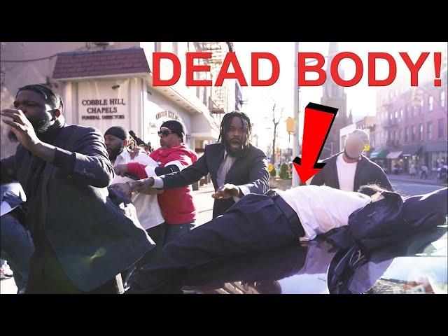 Funeral Director Takes Body Out Of The Coffin And Throws it On The Family Car