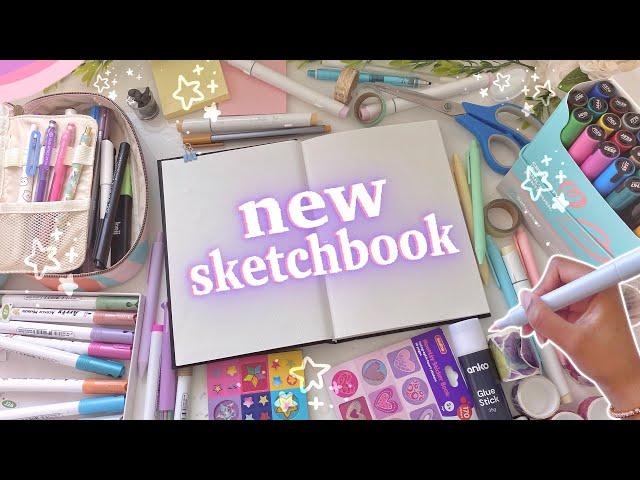 starting & customising my new sketchbook  drawing on the cover, first page & more!