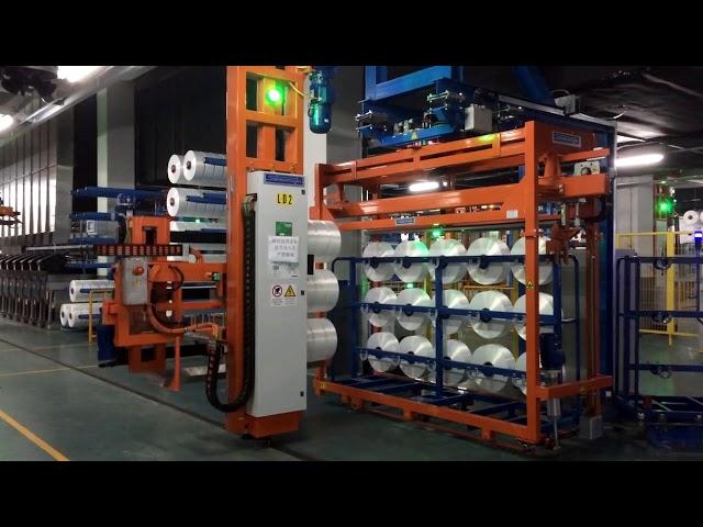 Bobbin doffing and packing system for large polyester plant