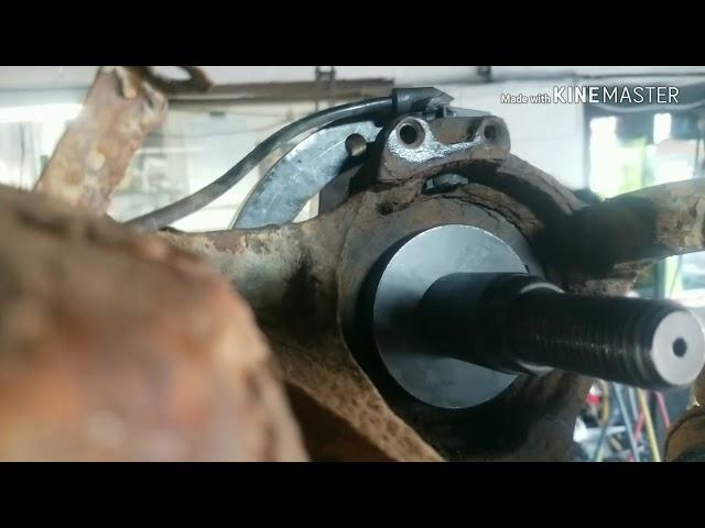 How to Repair Ford Escape 4X4 Rear Wheel Bearing,The Easy, Fast, Way