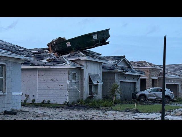 Tornado deposits dumpster onto roof of Palm Beach Gardens home