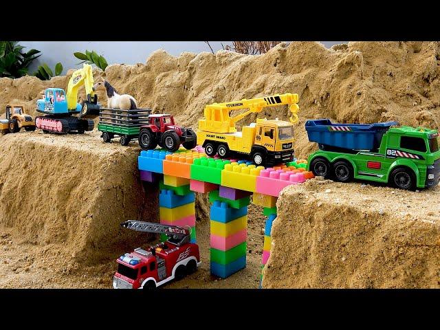 Construction vehicle rescue bridge with dump truck and crane truck toys