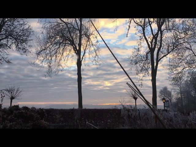 Beautiful morning with clouds moving like snowy mountains