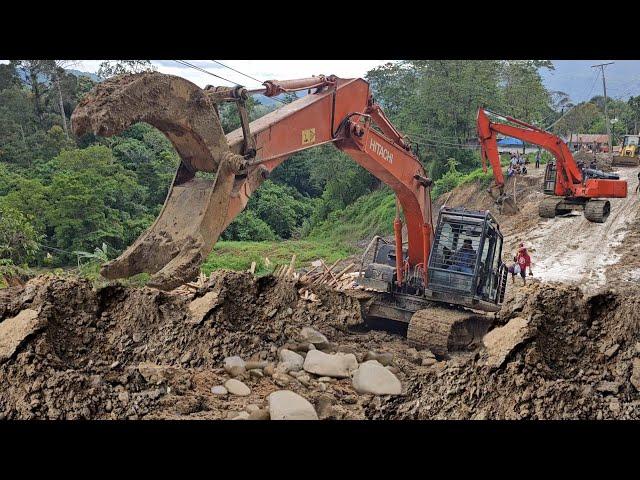 Excavator like going berserk, Batu Jomba incline is messed up